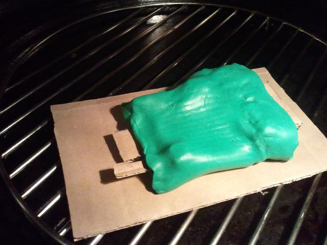 Cardboard with Fimo clay around it back