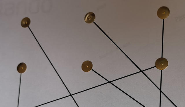 push the pins through